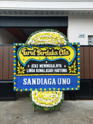 Papan Bunga Duka di Baki