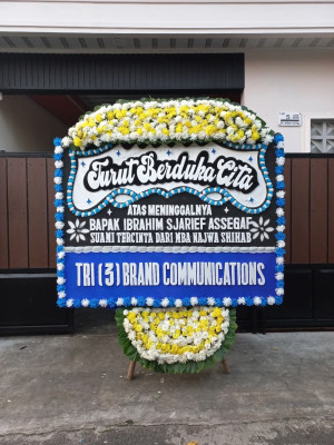Papan Bunga Duka di Baki